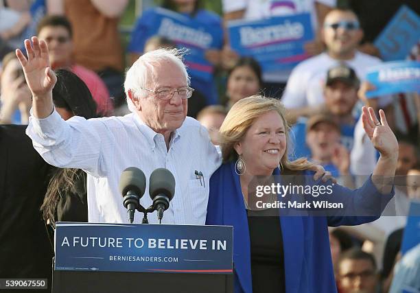 Sen. Bernie Sanders , and his wife Jane O'Meara Sanders appear at a campaign rally at Robert F. Kennedy Memorial Stadium June 9, 2016 in Washington,...