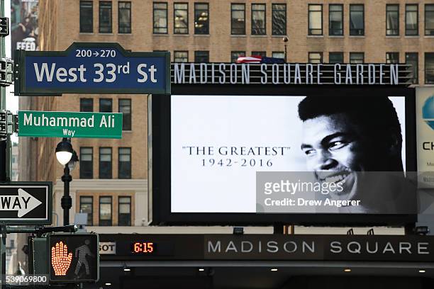 Muhammad Ali Way,' a temporary street sign in honor of the late boxer, is displayed on the corner of West 33rd Street and Seventh Avenue near Madison...