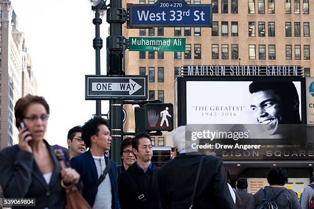 Muhammad Ali Way,' a temporary street sign in honor of the late boxer, is displayed on the corner of West 33rd Street and Seventh Avenue near Madison...