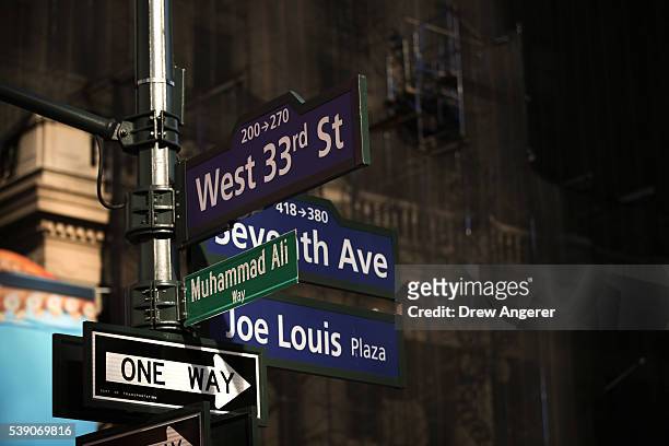 Muhammad Ali Way,' a temporary street sign in honor of the late boxer, is displayed on the corner of West 33rd Street and Seventh Avenue near Madison...