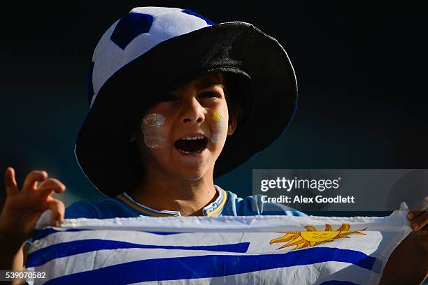 Fan of Uruguay cheers for his team on before a group C match between Uruguay and Venezuela at Lincoln Financial Field as part of Copa America...