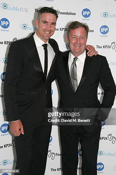 Kevin Pietersen and Piers Morgan attend the KP24 Foundation Charity Gala Dinner at The Waldorf Hilton Hotel on June 9, 2016 in London, England.