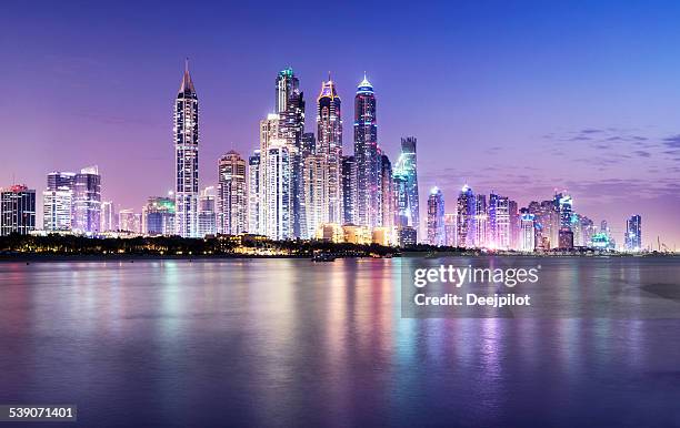 dubai marina skyline at twilight united arab emirates - dubai marina stock pictures, royalty-free photos & images
