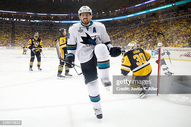 Logan Couture of the San Jose Sharks celebrates after scoring a goal against Matt Murray of the Pittsburgh Penguins during the first period in Game...