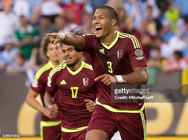 Salomon Rondon of Venezuela reacts after his goal along with Josef Martinez against Uruguay during the 2016 Copa America Centenario Group C match at...