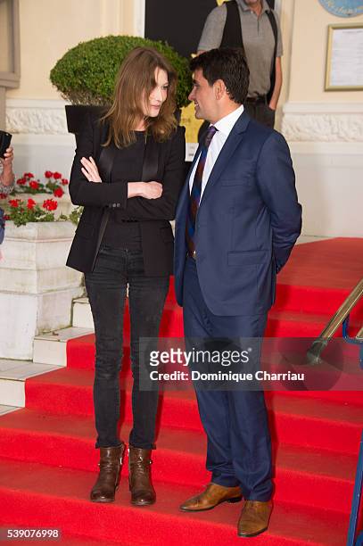 Carla Bruni Sarkozy and Tristan Duval attend the Opening Dinner for the benefit of the association " Children of the sun" during the 30th Cabourg...