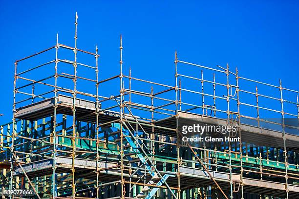 People work on new housing at North Lakes on June 10, 2016 in Brisbane, Australia. Economic forecasts suggest Brisbane is on track to overtake...