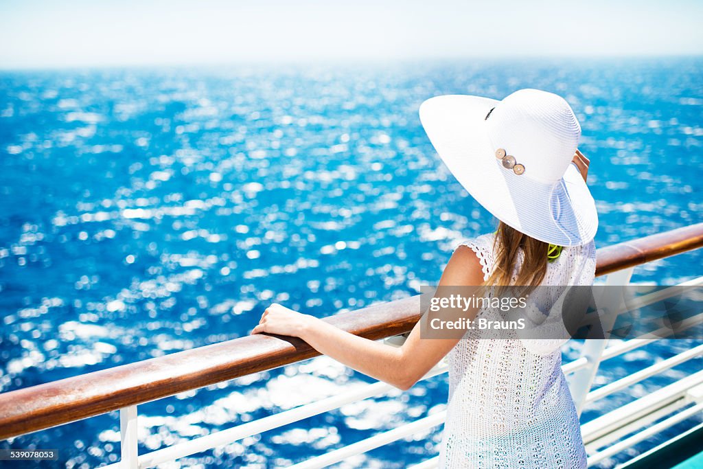 Woman enjoying on a cruise.