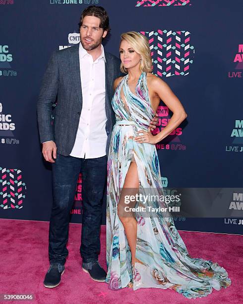 Nashville Predators forward Mike Fisher and Carrie Underwood attend the 2016 CMT Music awards at the Bridgestone Arena on June 8, 2016 in Nashville,...