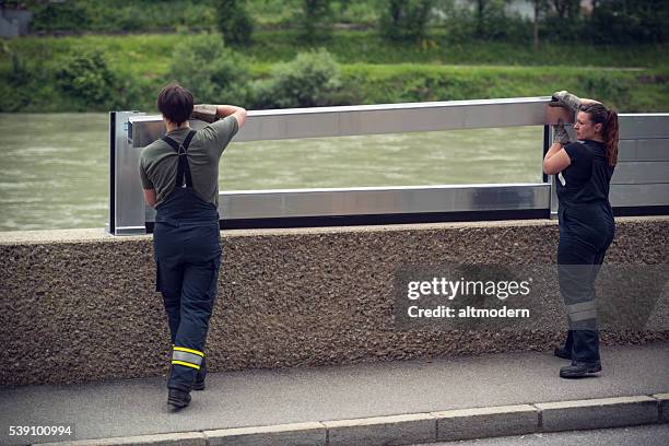 mobile flood barrier - high tide stock pictures, royalty-free photos & images