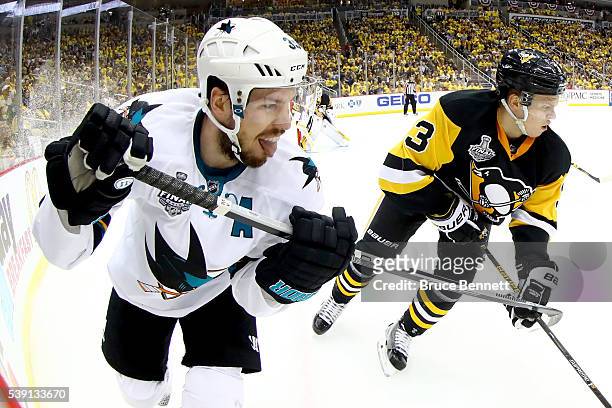 Logan Couture of the San Jose Sharks skates alongside Olli Maatta of the Pittsburgh Penguins in the second period in Game Five of the 2016 NHL...