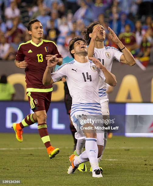 Edinson Cavani and Nicolas Lodeiro of Uruguay react after a shot went wide against Venezuela during the 2016 Copa America Centenario Group C match at...