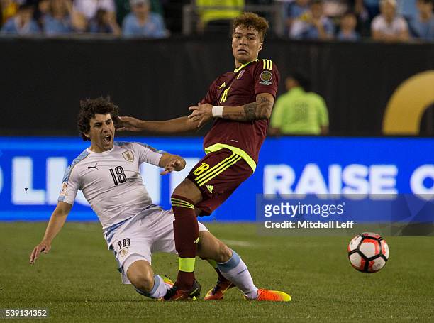 Adalberto Penaranda of Venezuela collides with Martias Corujo of Uruguay during the 2016 Copa America Centenario Group C match at Lincoln Financial...