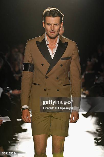 Alex Lundqvist walks the runway during the 7th Annual amfAR Inspiration Gala at Skylight at Moynihan Station on June 9, 2016 in New York City.