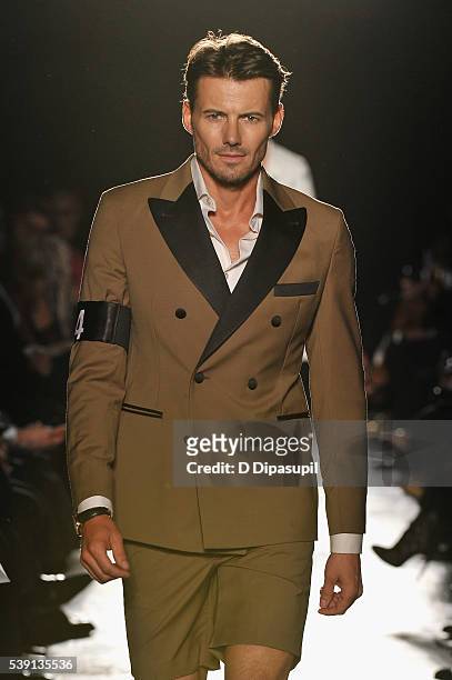 Alex Lundqvist walks the runway during the 7th Annual amfAR Inspiration Gala at Skylight at Moynihan Station on June 9, 2016 in New York City.
