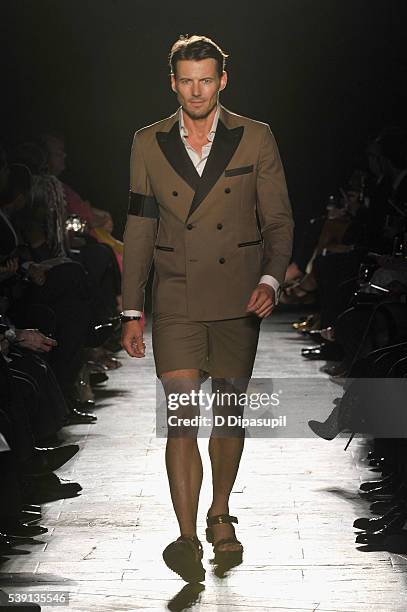 Alex Lundqvist walks the runway during the 7th Annual amfAR Inspiration Gala at Skylight at Moynihan Station on June 9, 2016 in New York City.