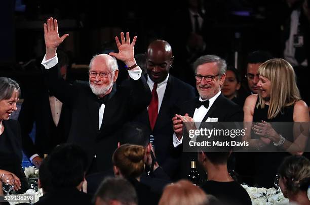 Life Achievement Award Recipient John Williams, director Steven Spielberg and actress Kate Capshaw pose in the audience during American Film...