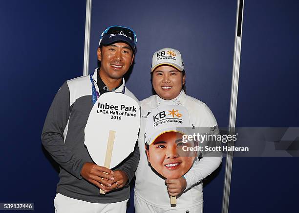 Inbee Park of South Korea poses with her husband and coach Gi Hyeob Nam after she gained entry in the LPGA Hall of Fame after finishing the first...