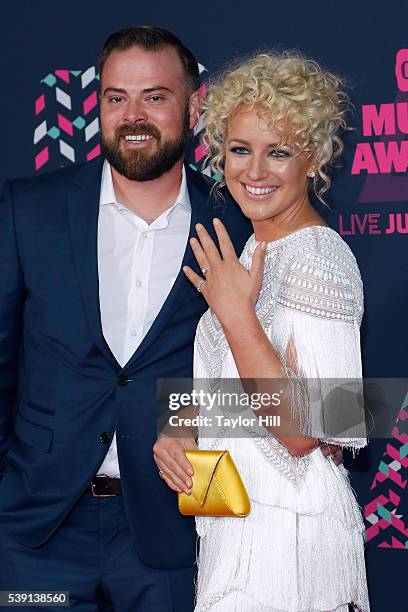 Adam Weaver and Cam attend the 2016 CMT Music awards at the Bridgestone Arena on June 8, 2016 in Nashville, Tennessee.