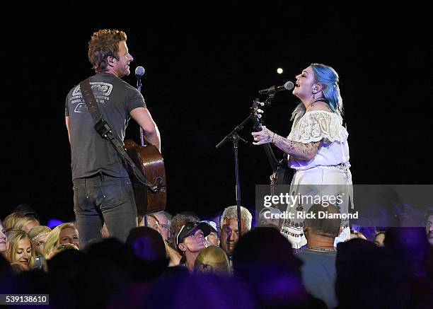 Singers Dierks Bentley and Elle King perform onstage during 2016 CMA Festival - Day 1 at Nissan Stadium on June 9, 2016 in Nashville, Tennessee.
