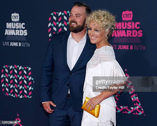 Adam Weaver and Cam attend the 2016 CMT Music awards at the Bridgestone Arena on June 8, 2016 in Nashville, Tennessee.