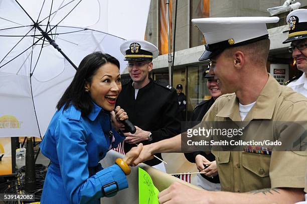 Ann Curry, an anchor on The Today Show, thanks a Marine for his service while taping The Today Show, New York, 2012. Image courtesy Mass...