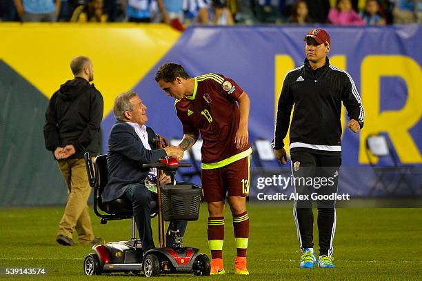 Head coach of Uruguay Oscar Tabarez shakes the hand of Luis Manuel Seijas of Venezuela after a group C match between Uruguay and Venezuela at...