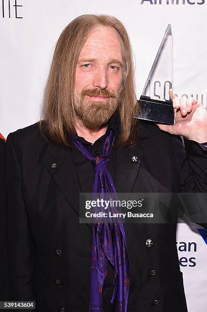 Tom Petty poses with award during Songwriters Hall Of Fame 47th Annual Induction And Awards at Marriott Marquis Hotel on June 9, 2016 in New York...