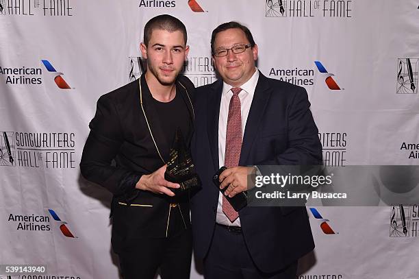 Nick Jonas and Paul Jonas attend Songwriters Hall Of Fame 47th Annual Induction And Awards at Marriott Marquis Hotel on June 9, 2016 in New York City.