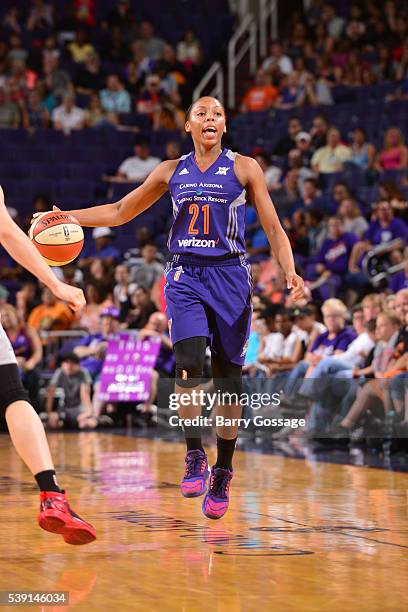 Nirra Fields of the Phoenix Mercury defends the ball against the San Antonio Stars during the game on June 9, 2016 at Talking Stick Resort Arena in...