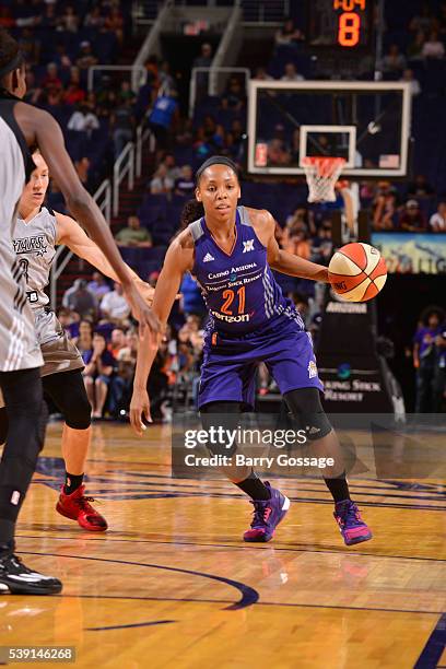 Nirra Fields of the Phoenix Mercury drives to the basket against the San Antonio Stars during the game on June 9, 2016 at Talking Stick Resort Arena...