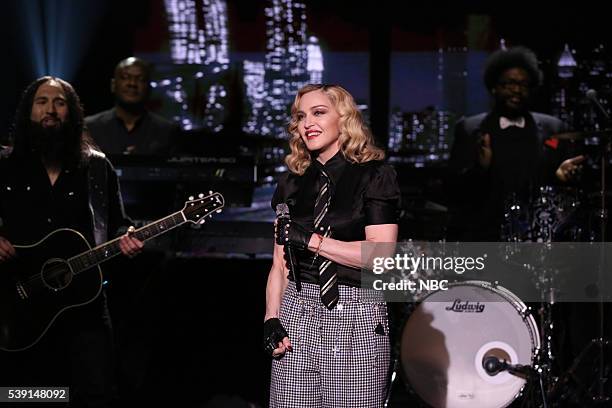 Episode 0485 -- Pictured: Musical guest Madonna performs with The Roots on June 9, 2016 --