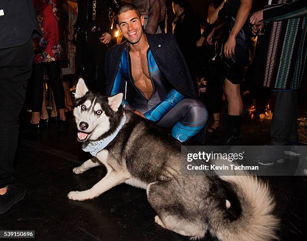 Model prepares backstage before the fashion show at the 7th Annual amfAR Inspiration Gala at Skylight at Moynihan Station on June 9, 2016 in New York...