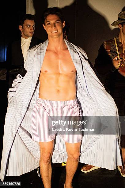 Model prepares backstage before the fashion show at the 7th Annual amfAR Inspiration Gala at Skylight at Moynihan Station on June 9, 2016 in New York...