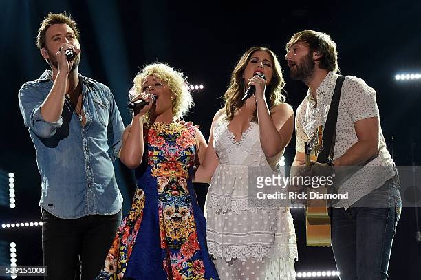 Singers Cam and Charles Kelley, Hillary Scott, and Dave Haywood of Lady Antebellum perform onstage during 2016 CMA Festival - Day 1 at Nissan Stadium...