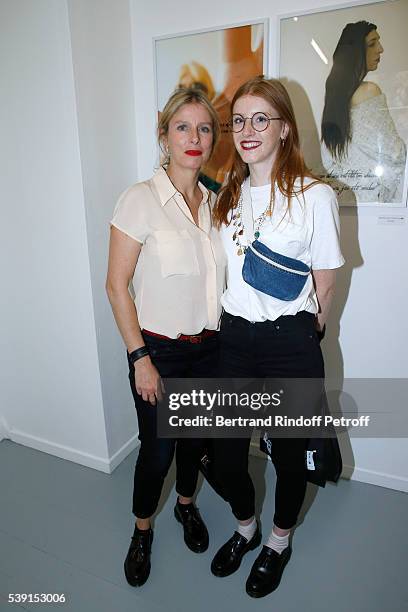 Actress Karin Viard and her daughter Margueritte Machuel attend the "55 Politiques", Exhibition of Stephanie Murat's Pictures - Opening Party at...