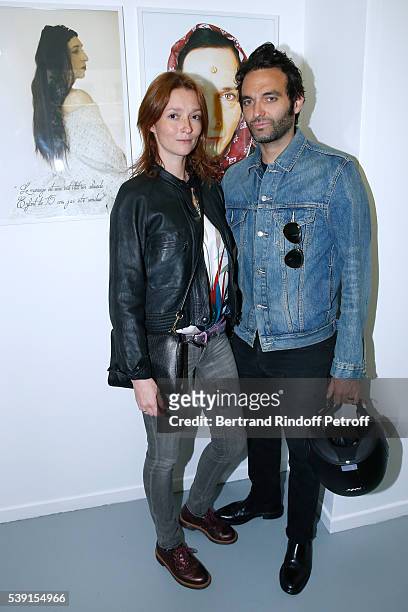 Audrey Marnay and guest attend the "55 Politiques", Exhibition of Stephanie Murat's Pictures - Opening Party at Galerie Dupin on June 9, 2016 in...