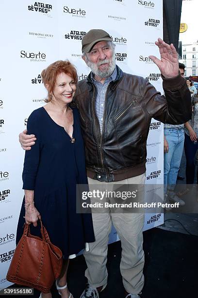 Actor Jean-Pierre Marielle and his wife Agathe Natanson attend the "55 Politiques", Exhibition of Stephanie Murat's Pictures - Opening Party at...