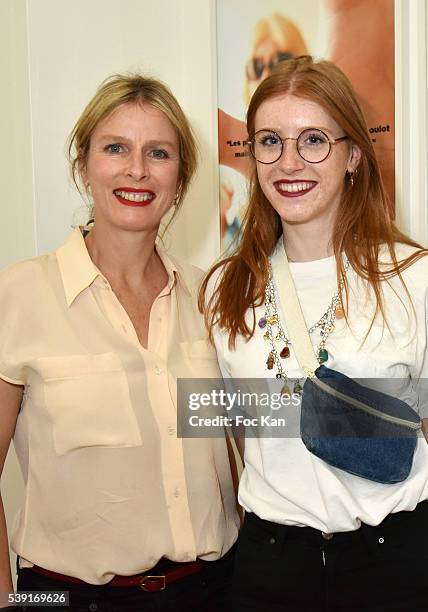 Karine Viard and her daughter Marguerite Machuel attend "55 Politiques" : Exhibition Preview at Galerie Dupin on June 9, 2016 in Paris, France.