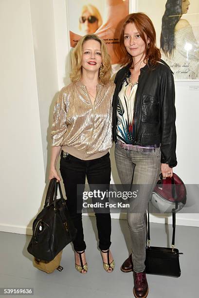 Karine Viard, Stephane Foenkinos and Lea Seydoux attend "55 Politiques" : Exhibition Preview at Galerie Dupin on June 9, 2016 in Paris, France.