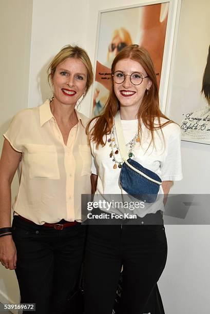 Karine Viard and her daughter Marguerite Machuel attend "55 Politiques" : Exhibition Preview at Galerie Dupin on June 9, 2016 in Paris, France.