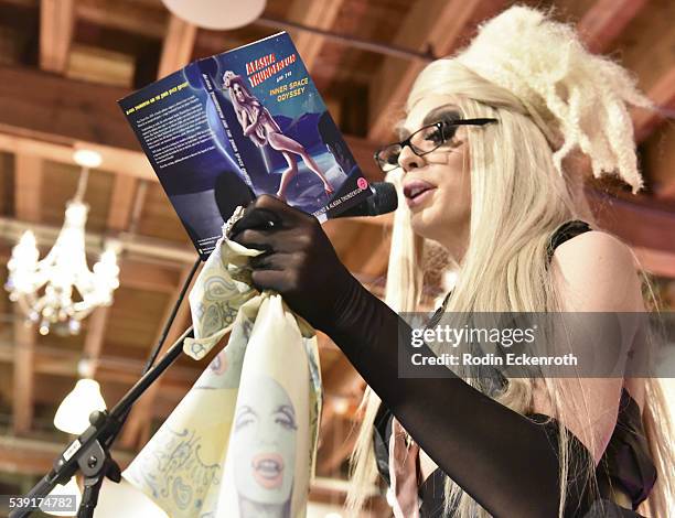 Drag queen Alaska reads a passage from her book during the opening of PEG: The Store + PEG Records Artist Showcase at Arts District Co-op on June 9,...