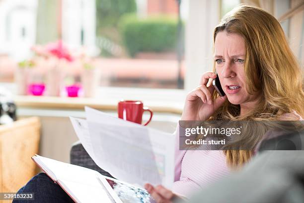 telephone bill query - complaining stock pictures, royalty-free photos & images