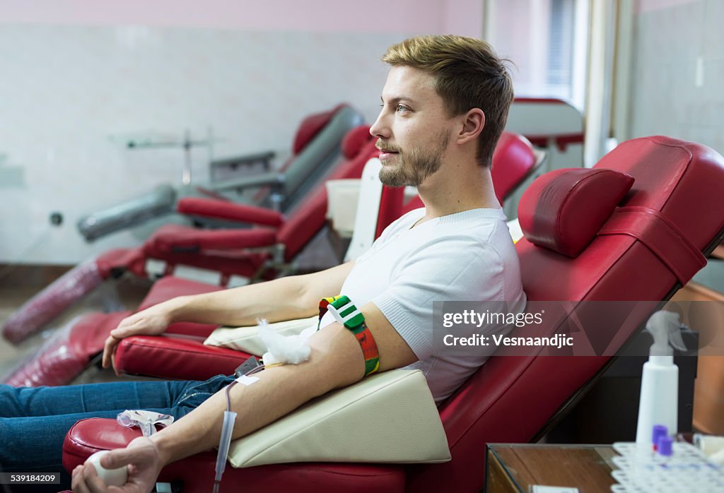 Man giving blood donation