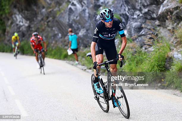 Chris Froome of Great Britain and Team SKY distances Richie Porte of Australia and the BMC Racing Team and race leader Alberto Contador of Spain and...