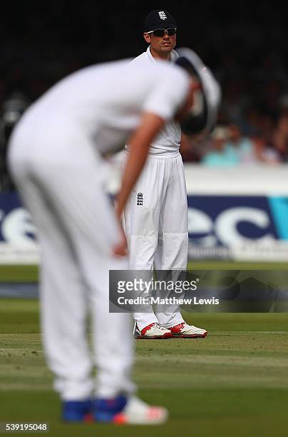 Alastair Cook of England looks on at Stuart Broad of England, after he has a slight injury in the out field during day two of the 3rd Investec Test...