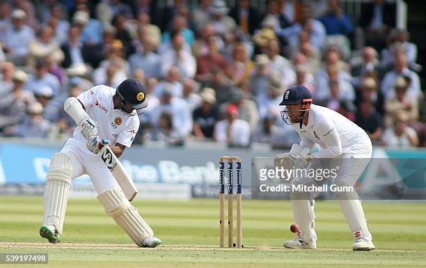 Dimuth Karunaratne of Sri Lanka plays a shot during day two of the 3rd Investec Test match between England and Sri Lanka at Lords Cricket Ground on...