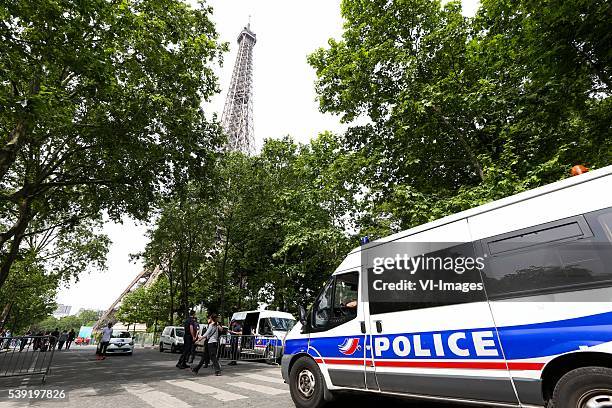 Police near the Eiffel Tower during the Euro group stage match between France and Romania at the Stade de France on june 10, 2016 in Saint-Denis,...