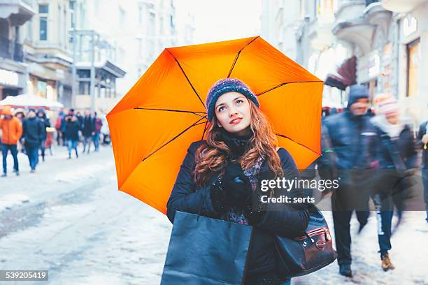 day dreaming of shopping in beyoglu, istanbul - female fashion with umbrella stock pictures, royalty-free photos & images