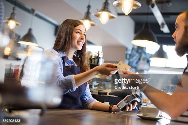 coffee shop credit card payment - ordering food stock pictures, royalty-free photos & images